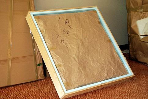 Place your artwork inside and seal the crate around it. Place your artwork inside and seal the crate around it.